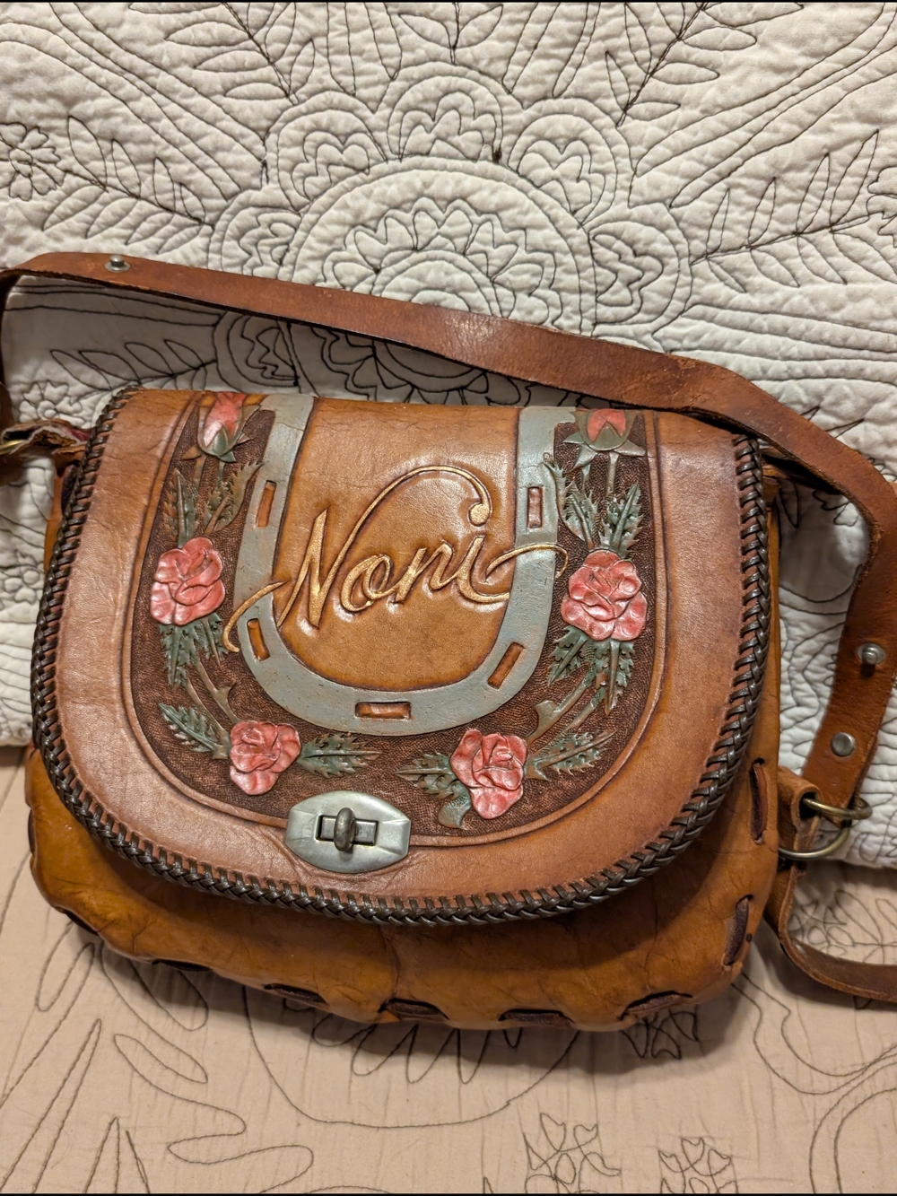 Hand-Tooled Brown Leather Crossbody Bag with Floral Detail -